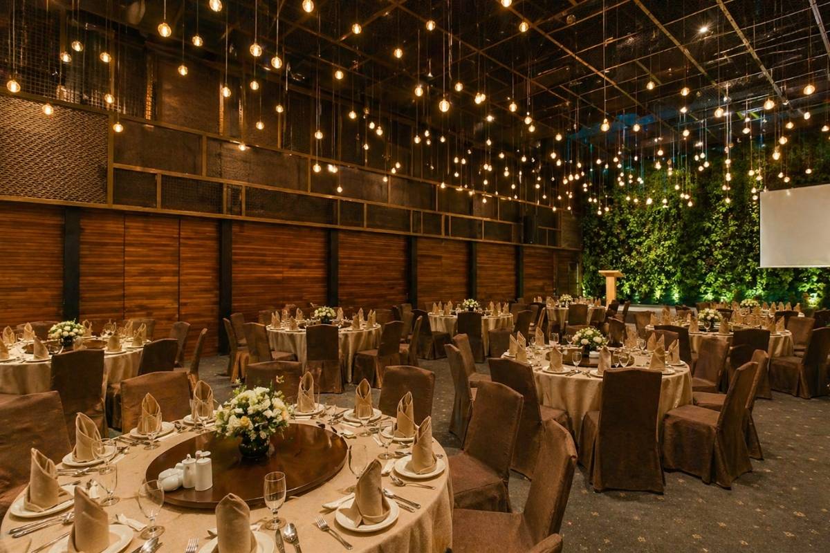 elegant wedding banquet space in District 1 with warm lighting and refined table settings